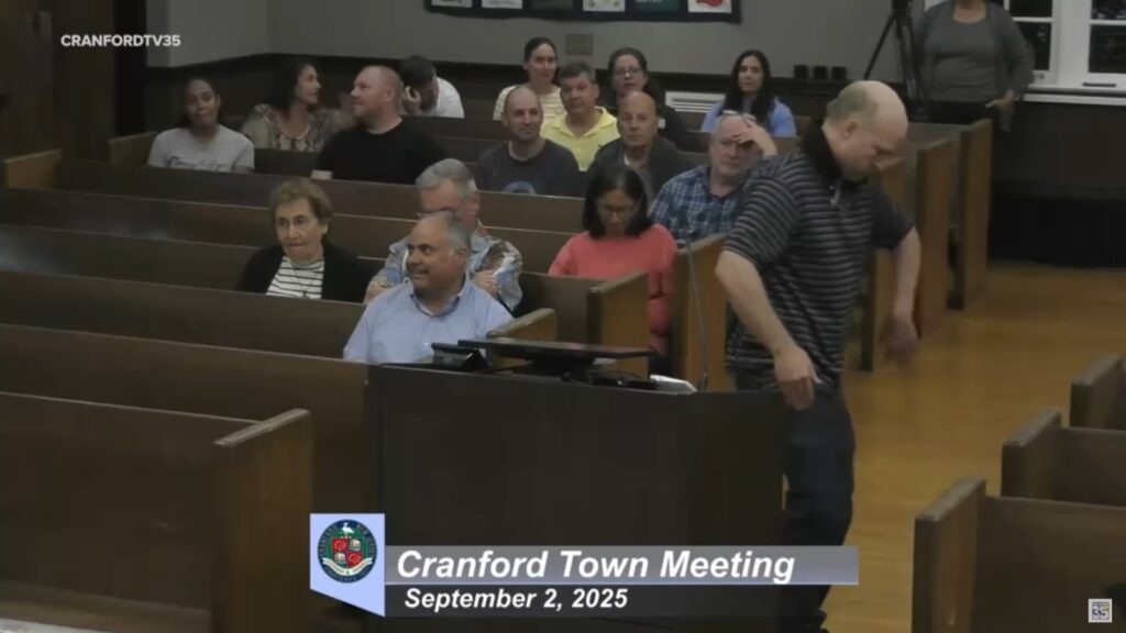 Man breakdances during town hall meeting in Cranford, NJ to protest rising property taxes