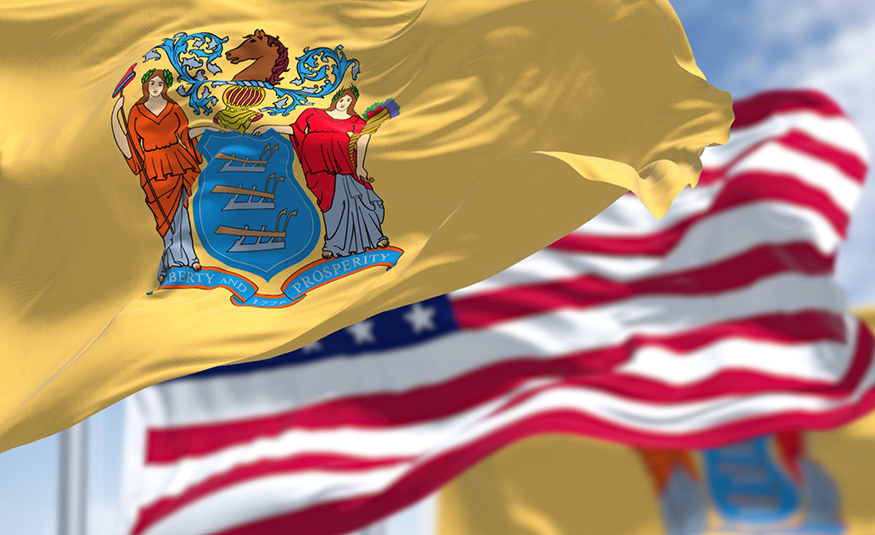 Most NJ voters say US on wrong track, poll finds The New Jersey state flag waving along with the national flag of the United States of America.