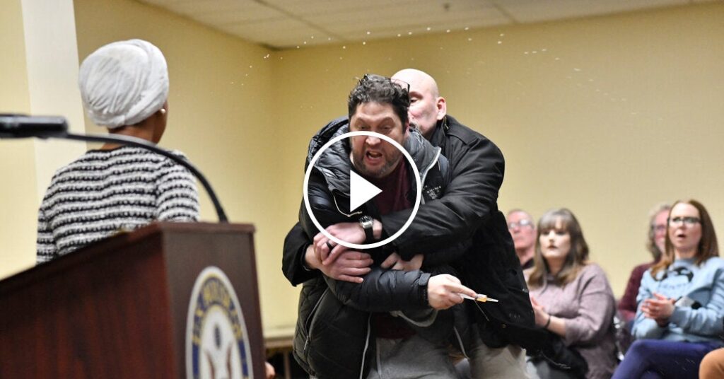 Man Lunges at Ilhan Omar During Minneapolis Town Hall