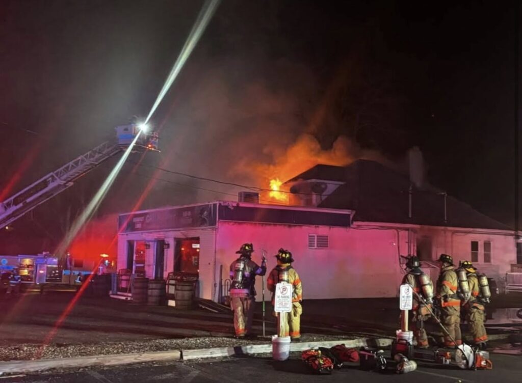 Volunteer firefighters at the scene of the Monday night fire at Grits & Grace at 507 Atlantic City Blvd. in Bayville.