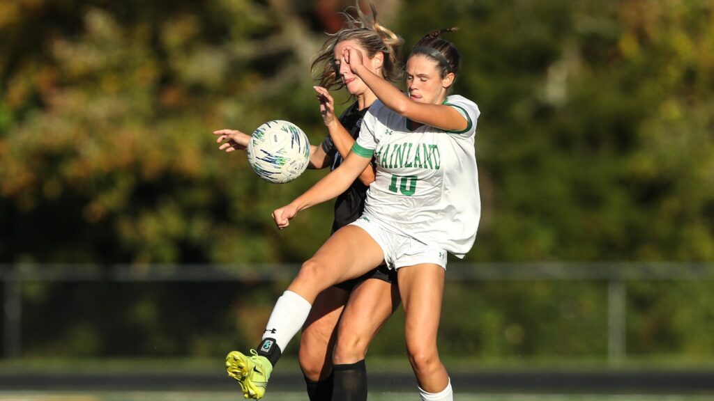Emma Tenaglia (10) of Mainland and Payton Crowell (17) of Egg Harbor battle for the ball during the Cape Atlantic League girls soccer final between Egg Harbor and Mainland at Egg Harbor Township High School in Egg Harbor, NJ on 10/22/25.