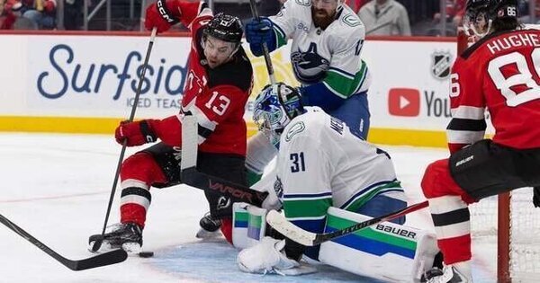 Nico Hischier scores milestone goal, leads Devils past Canucks Nico Hischier scores milestone goal, leads Devils past Canucks